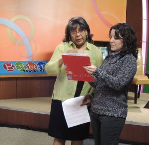 Reviewing the script with producer, Sherie (not to be confused with my best friend, Sheri, who was on set taking photos of me!), before the show.