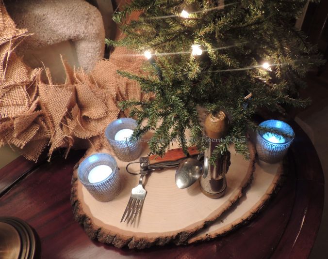 Tablescapes at Table Twenty-One, 'Twas the Night Before Christmas: Burlap wreath, wood slices, Swiss Army camping gear