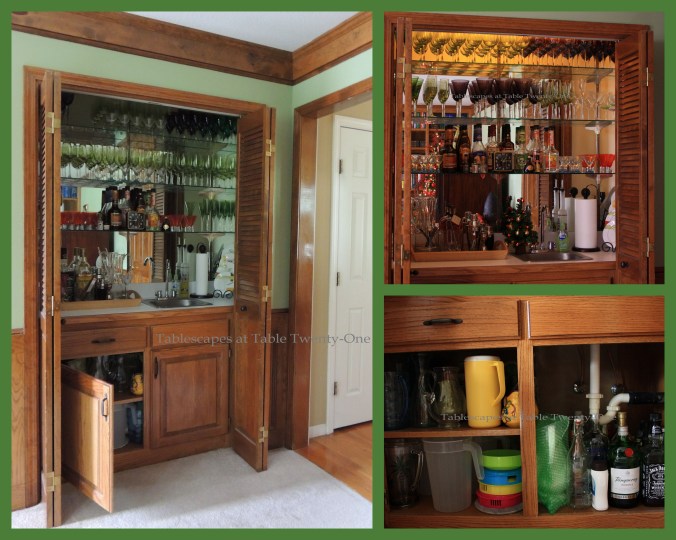 The bar is laden with lots of stemware above with pitchers and other serving vessels beneath.