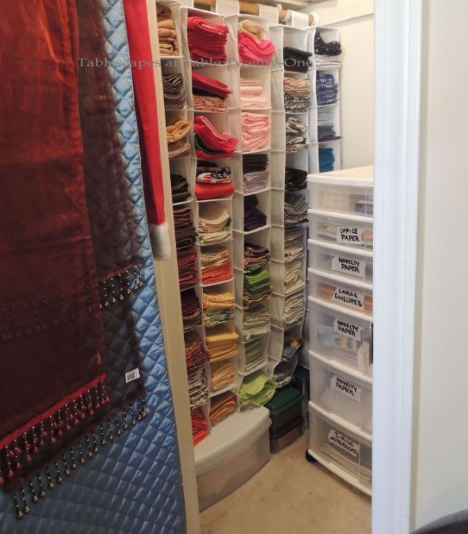 In my office closet are 5 shoe hangers filled with hundreds of napkins. More napkins are stored in plastic drawers on the floor.