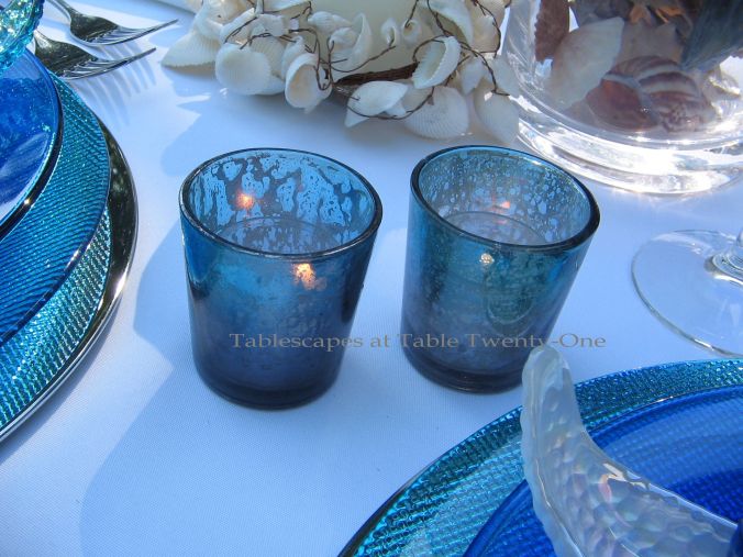 Tablescapes at Table Twenty-One, www.tabletwentyone.wordpress.com, Ocean Blue – Starfish & Seashells:  turquoise, cobalt blue  & silver mercury glass votive holders