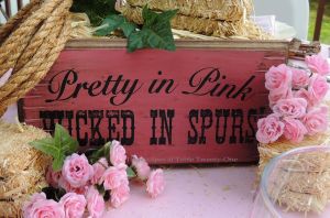 INSPIRATION: This fun "Pretty in Pink, Wicked in Spurs" sign found at Hobby Lobby that works well for Breast Cancer Awareness Month AND the Kansas City American Royal!