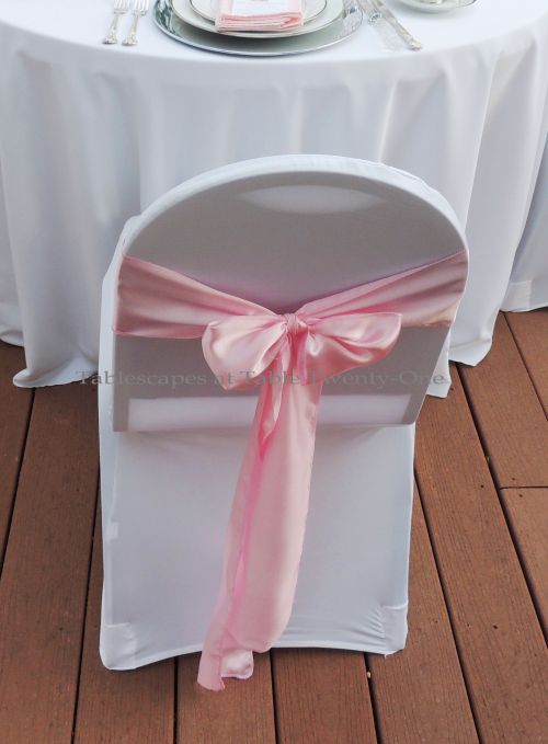 Tablescapes at Table Twenty-One, www.tabletwentyone.wordpress.com, Bald Is Beautiful: Banquet chair with stretch white chair cover and pink satin sash from LinenTablecloth.com