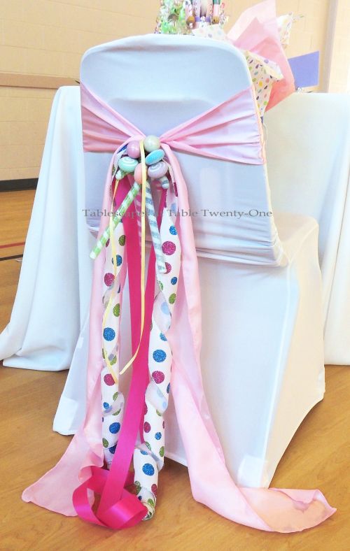 Alycia Nichols, Tablescapes at Table Twenty-One, www.tabletwentyone.wordpress.com, “Confectionery Christmas” – Pastel chair with candy swag