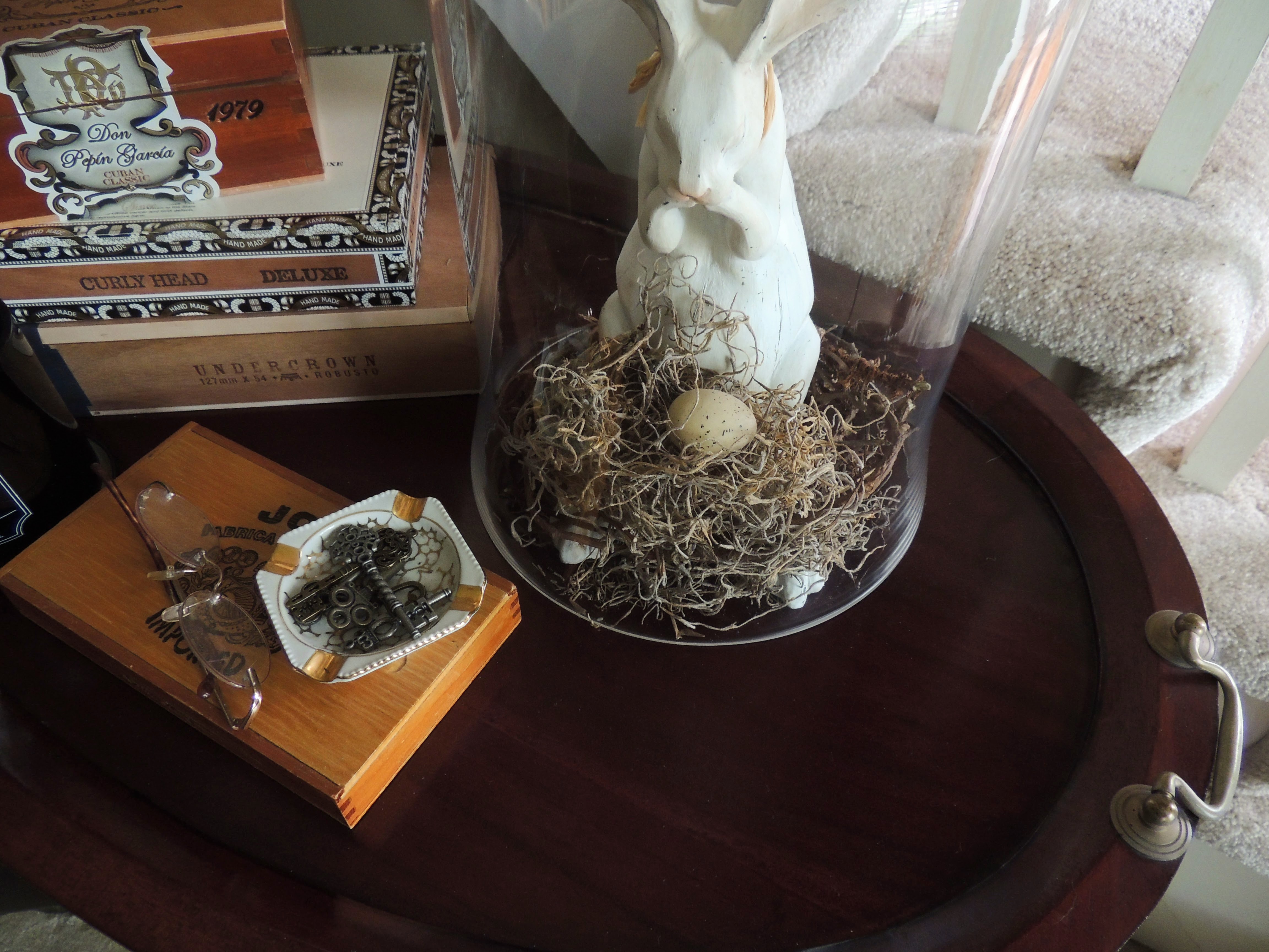 Wooden bunny under glass cloche with Spanish moss nest. www.tabletwentyone.wordpress.com